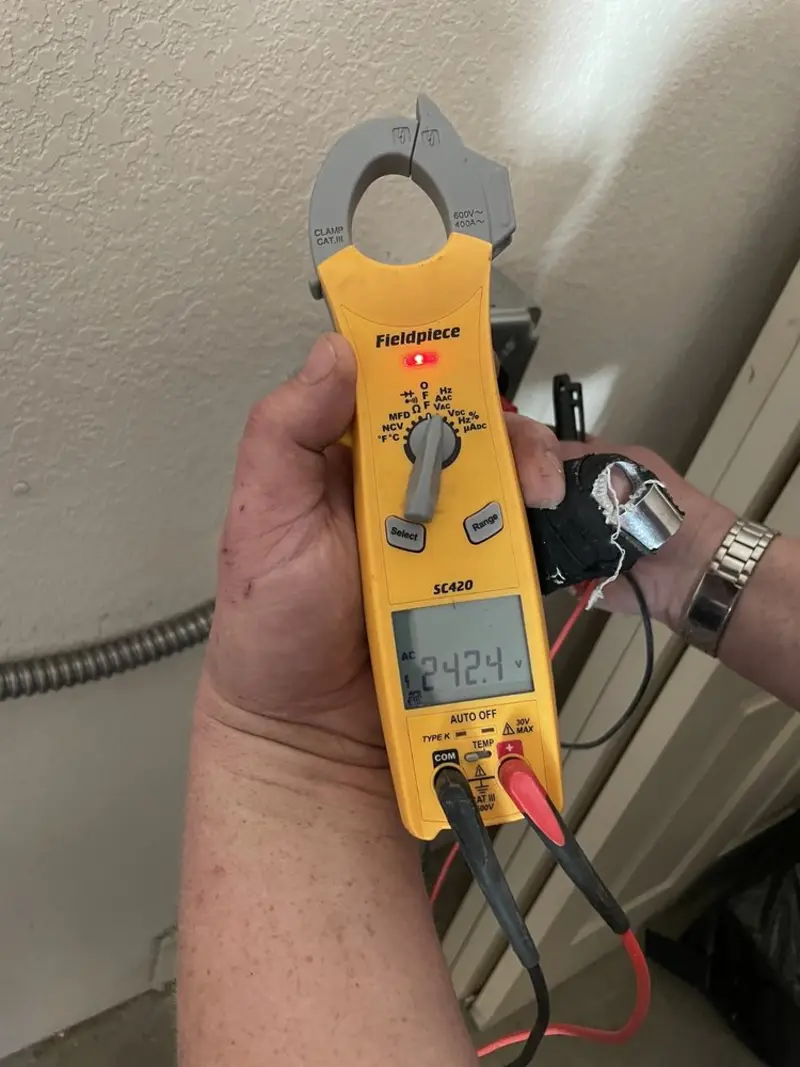 Voltage testing with clamp meter during Hot Tub / Pool Electrical Wiring in Carlinville